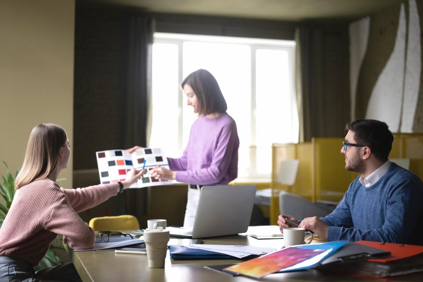 Modern budget planning session with digital tools and traditional methods