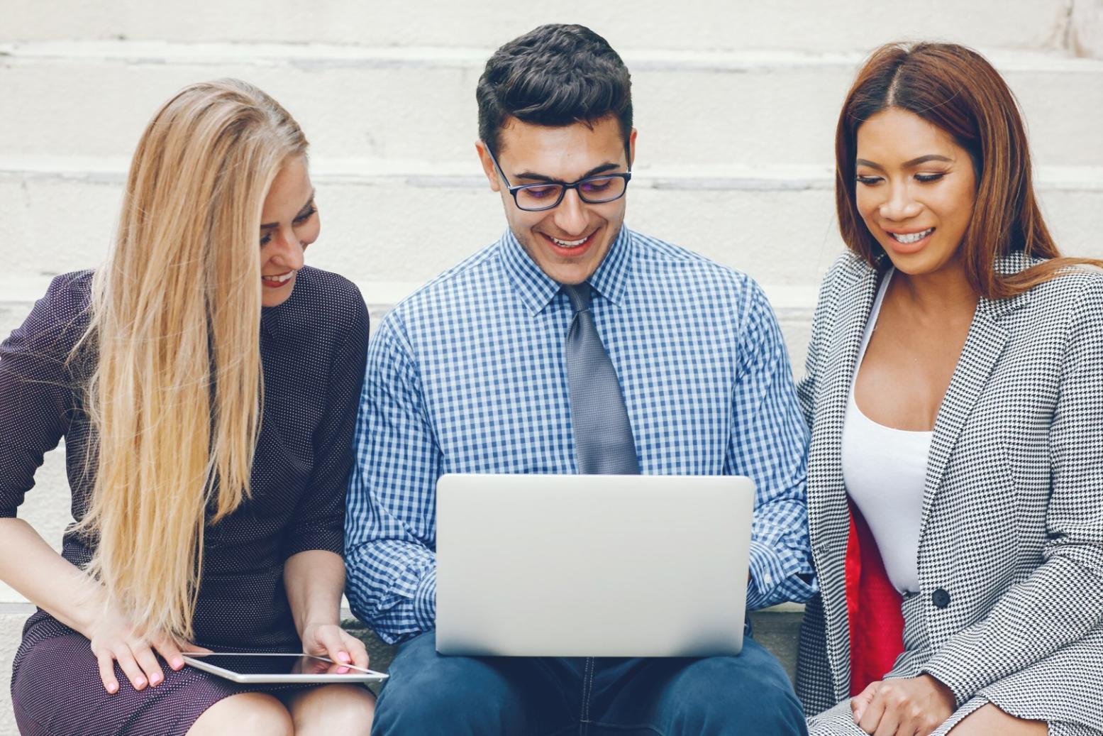 Person reviewing financial documents and budget categories in organized workspace