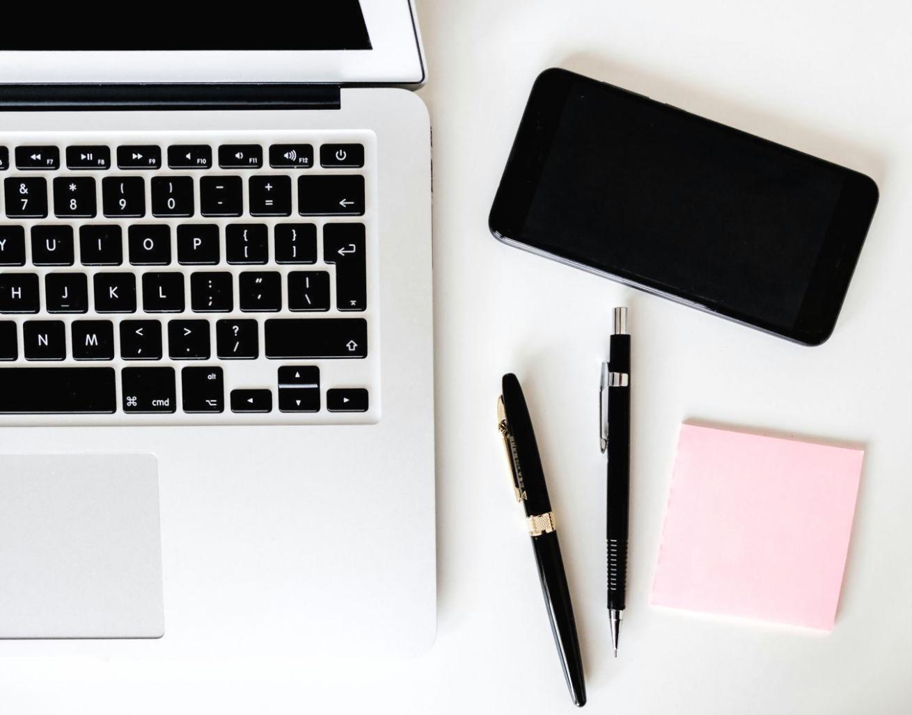 Financial planning workspace with organized documents and budgeting materials